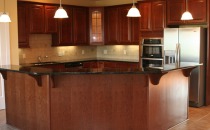 Kitchen Paprika cabinets island w mounts and pendant lighting